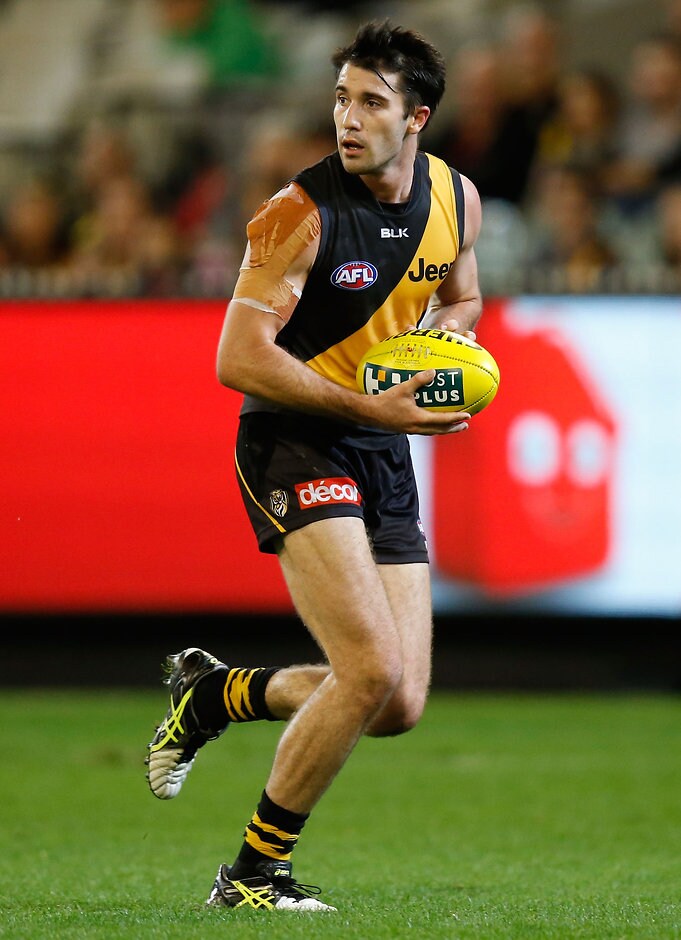 AFL 2016 Rd 06 - Richmond v Port Adelaide MELBOURNE, AUSTRALIA - APRIL 30: Corey Ellis of the Tigers in action during the 2016 AFL Round 06 match between the Richmond Tigers and Port Adelaide Power at the Melbourne Cricket Ground, Melbourne on April 30, 2016. (Photo by Michael Willson/AFL Media)